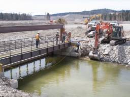 Polley Lake weir, water control structure, under construction at outlet of Polley Lake--Apr 2015